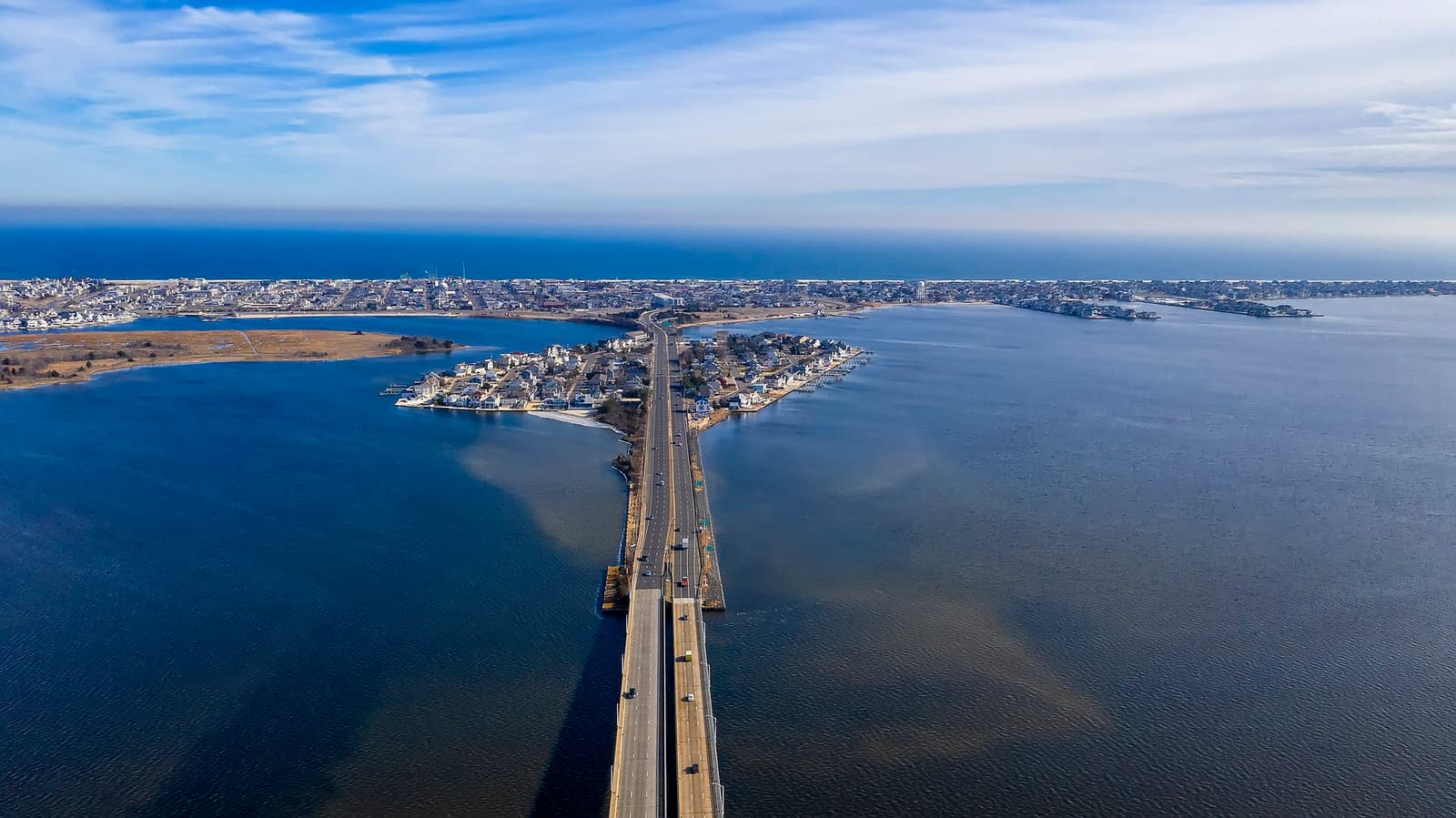Lavallette NJ boardwalk and oceanfront homes on the Barnegat Peninsula barrier island at golden hour